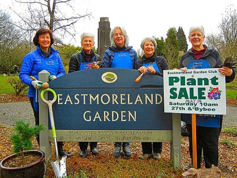 At the site of the May 14th plant sale and Gathering at the Garden theyre organizing, here are Eastmoreland Garden Club members ‐ from left: Theresa Lovett, Judy Hayward, Carrie McGraw, Susan Hoover, and Marti Granmo. The conifer at lower left is an example of small trees that will be included in the plant sale.
